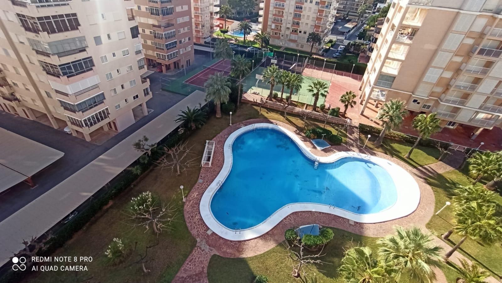 Piscina de Apartamento de alquiler en Benicasim / Benicàssim con Jardín privado, Terraza y Piscina comunitaria