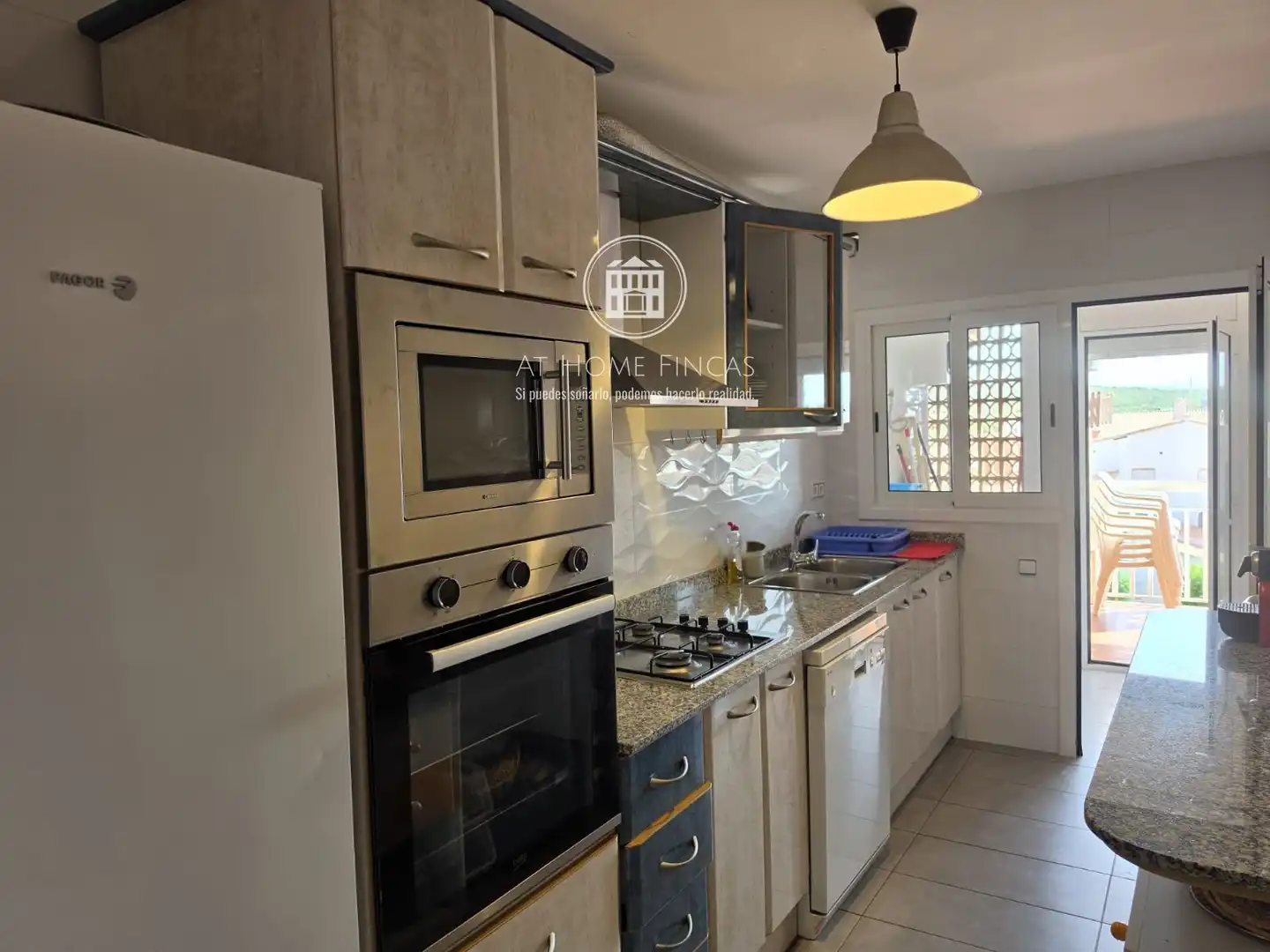 Kitchen of Flat for sale in Roda de Berà  with Terrace, Swimming Pool and Community pool