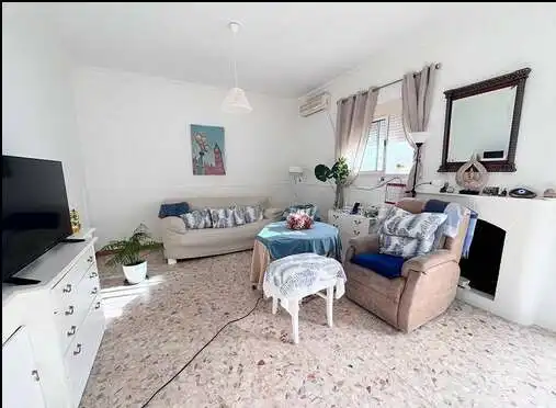 Sala d'estar de Casa o xalet en venda en Utrera amb Terrassa