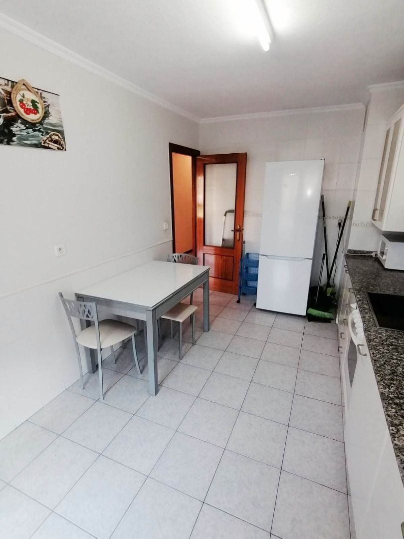 Kitchen of Flat for sale in Gijón   with Heating, Parquet flooring and Storage room