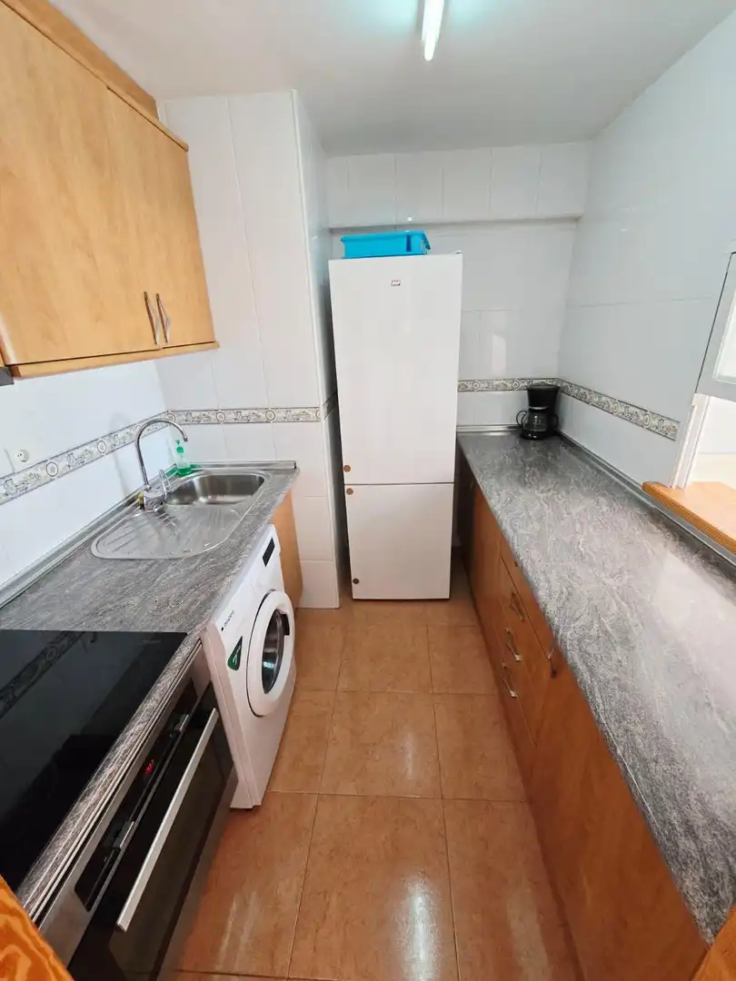 Cuina de Apartament en venda en Benidorm amb Aire condicionat, Moblat i Piscina comunitària