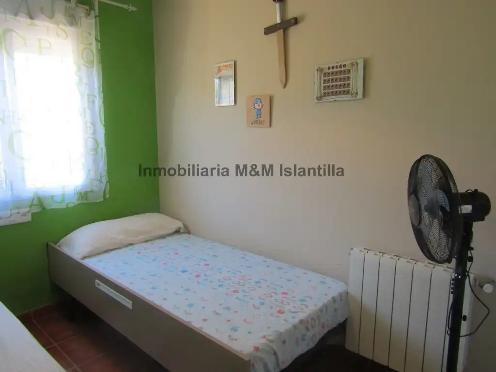 Habitación de Casa adosada en venta en Islantilla con Jardín privado, Terraza y Amueblado