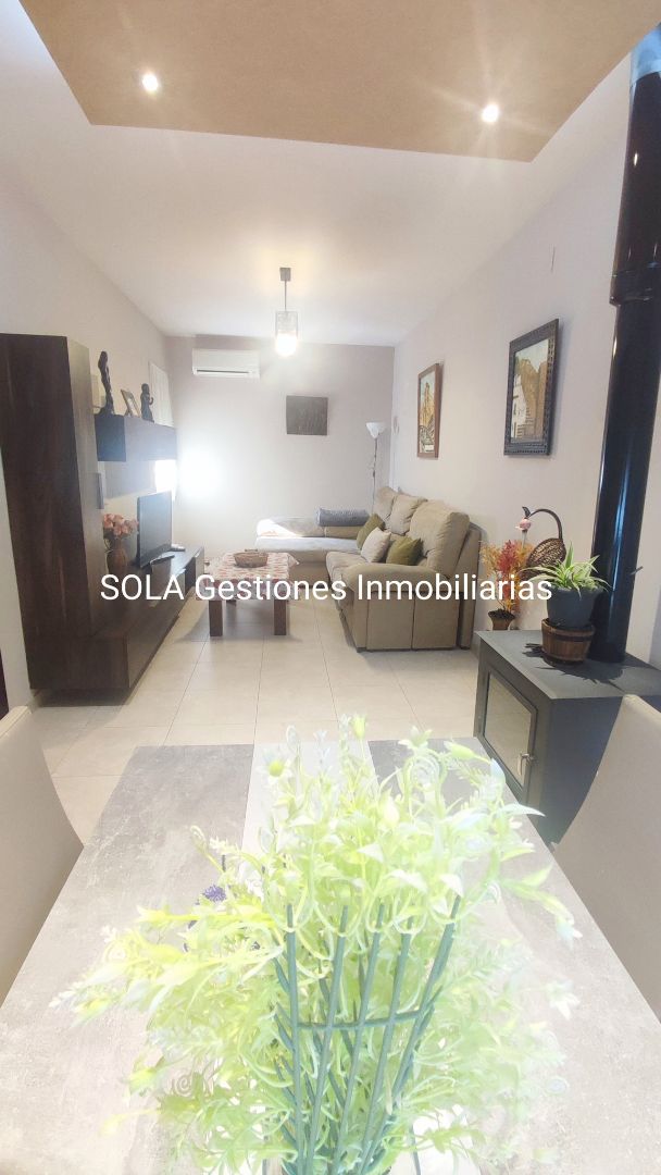 Living room of House or chalet for sale in Torreperogil  with Air Conditioner, Terrace and Storage room
