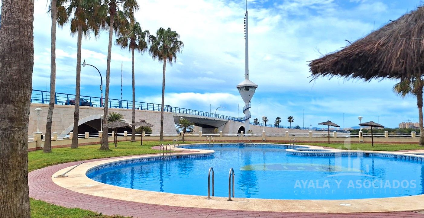 Swimming pool of Flat for sale in La Manga del Mar Menor  with Air Conditioner, Heating and Terrace
