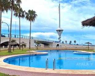 Swimming pool of Flat for sale in La Manga del Mar Menor  with Air Conditioner, Heating and Terrace