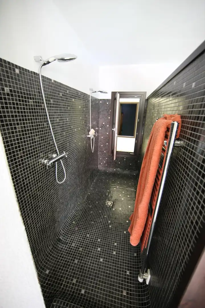 Baño de Casa adosada en venta en Breda con Calefacción, Jardín privado y Terraza
