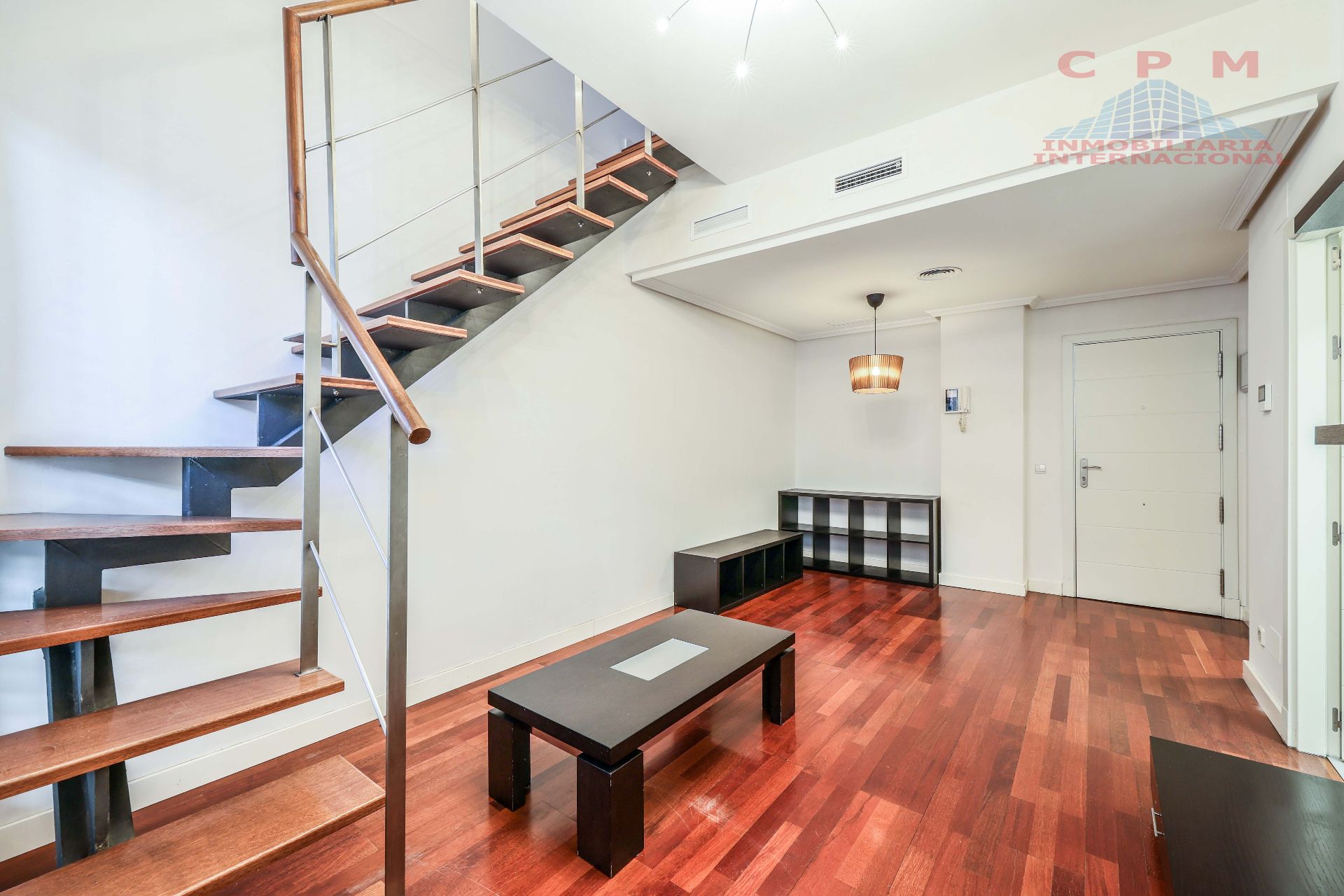 Living room of Duplex to rent in  Madrid Capital  with Air Conditioner, Heating and Parquet flooring