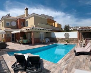 Swimming pool of Single-family semi-detached for sale in Vélez-Málaga  with Heating, Private garden and Terrace
