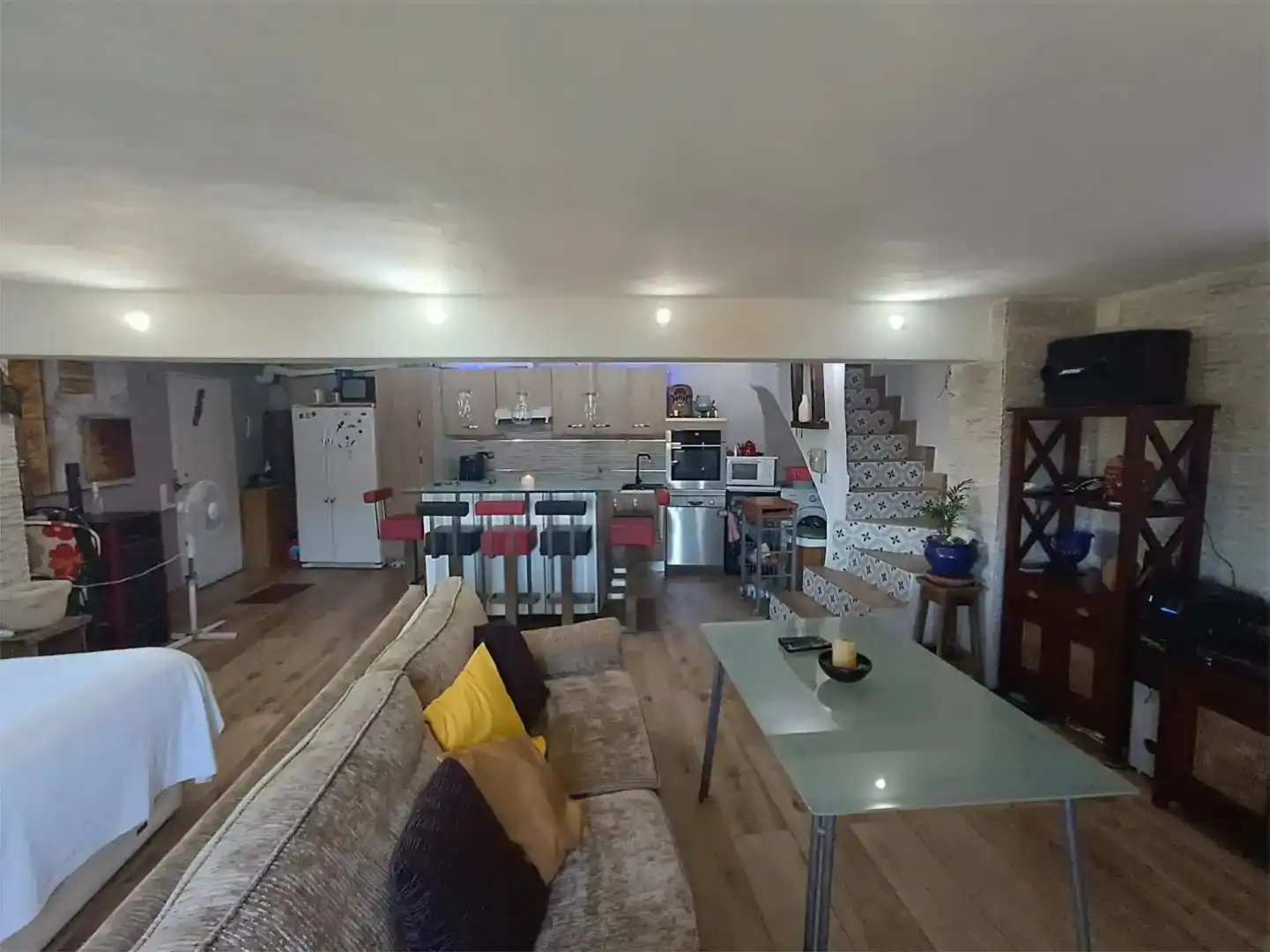 Sala d'estar de Casa adosada en venda en Noalejo amb Aire condicionat, Jardí privat i Traster