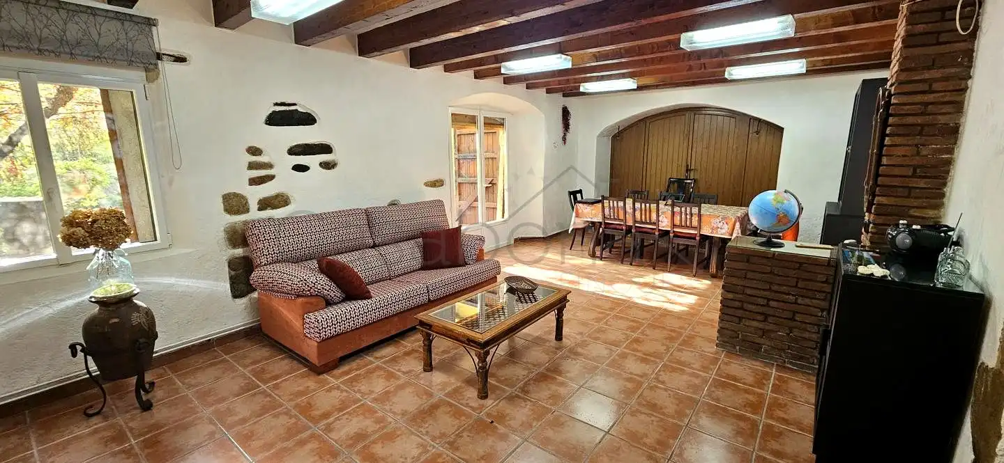 Casa rústica amb jardí en venda a Santa Maria de Palautordera