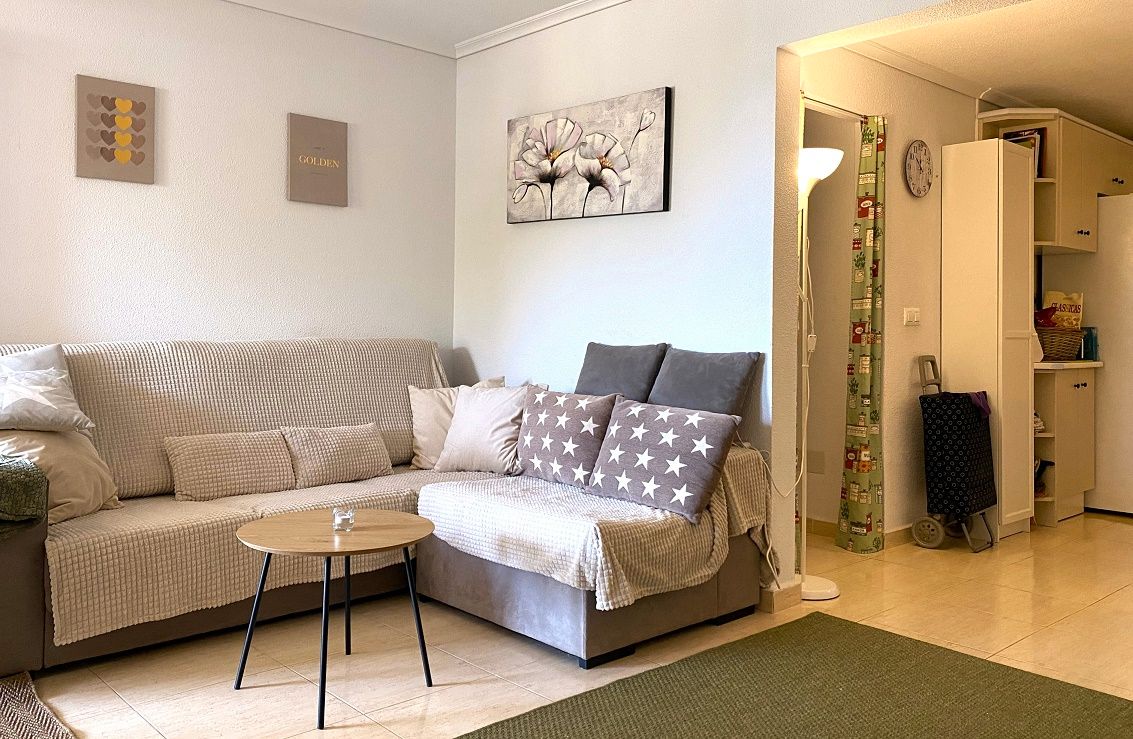 Sala d'estar de Planta baixa en venda en Santa Pola amb Aire condicionat, Jardí privat i Terrassa