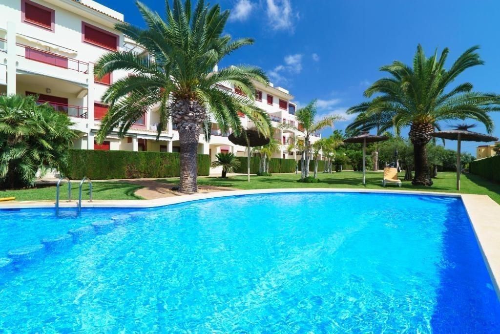 Swimming pool of Apartment to rent in Dénia  with Air Conditioner, Heating and Private garden