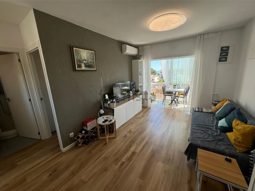 Sala de estar de Apartamento en venta en L'Escala con Aire acondicionado, Terraza y Trastero