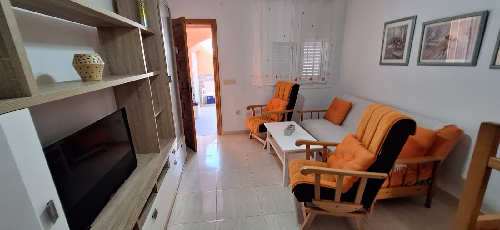 Sala d'estar de Apartament en venda en Torrevieja amb Aire condicionat, Terrassa i Moblat