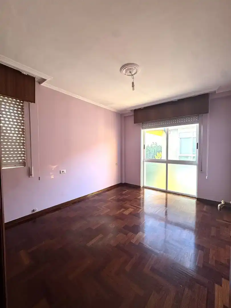 Schlafzimmer von Wohnung zum Verkauf in Teo mit Klimaanlage, Schwimmbad und Balkon