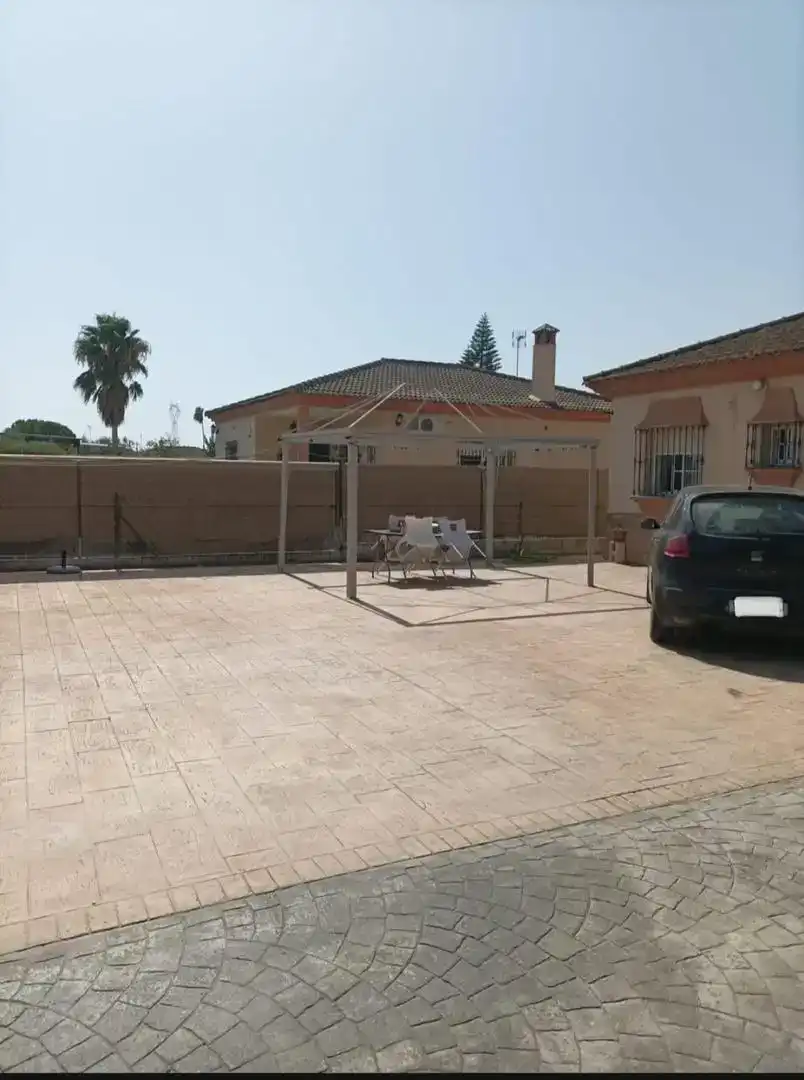 Terrassa de Casa o xalet en venda en Coria del Río amb Aire condicionat i Piscina