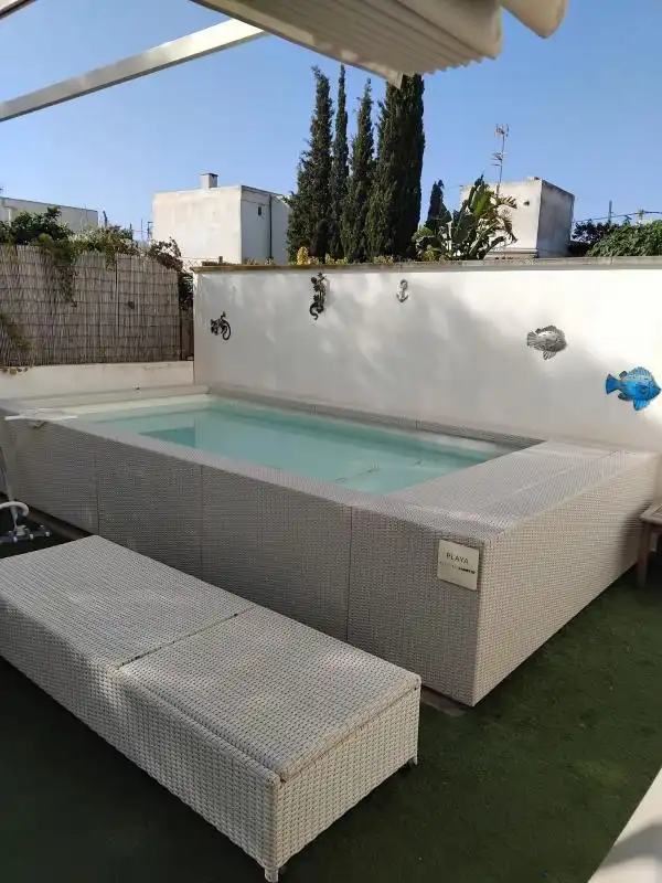 Piscina de Casa adosada en venda en Sant Antoni de Portmany amb Aire condicionat, Calefacció i Jardí privat