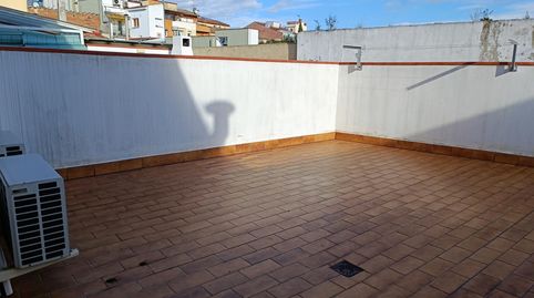 Amplio piso de 3 habitaciones con gran terraza de 60 m en el centro de Sant Celoni