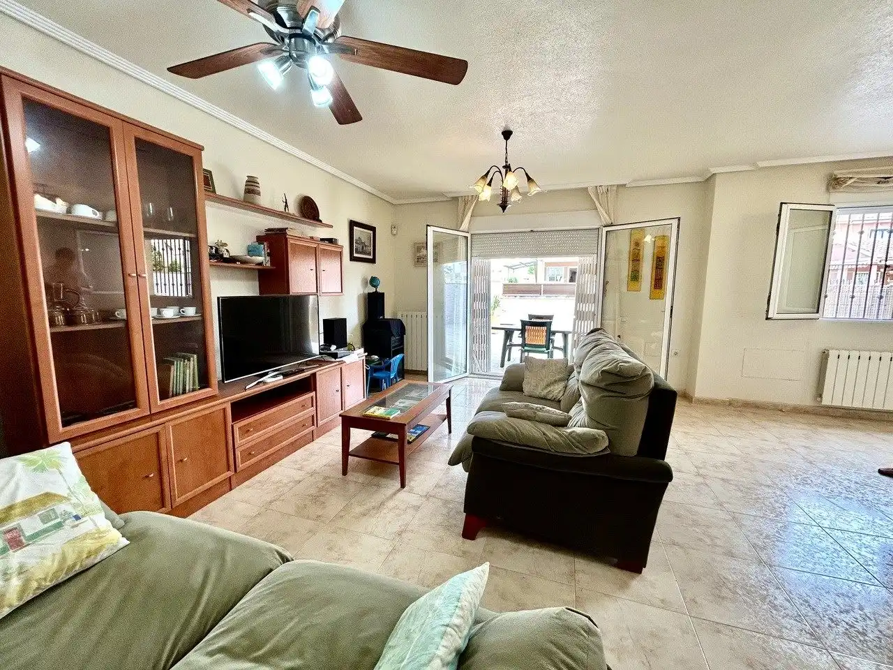 Sala de estar de Casa adosada en venta en Pilar de la Horadada con Jardín privado y Terraza
