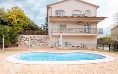 Swimming pool of House or chalet for sale in Bigues i Riells  with Air Conditioner, Terrace and Swimming Pool