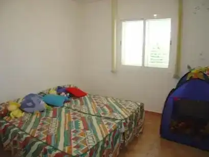 Dormitori de Apartament de lloguer en Mojácar amb Aire condicionat i Piscina