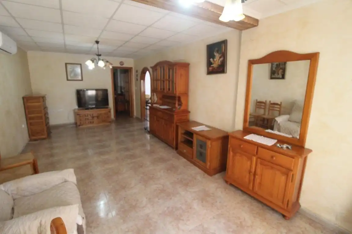 Sala de estar de Casa adosada en venta en Torrevieja con Aire acondicionado, Jardín privado y Terraza