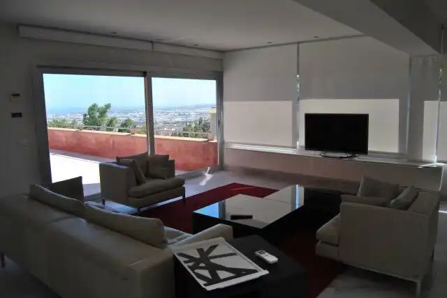 Sala de estar de Casa o chalet en venta en Málaga con Aire acondicionado, Calefacción y Jardín privado