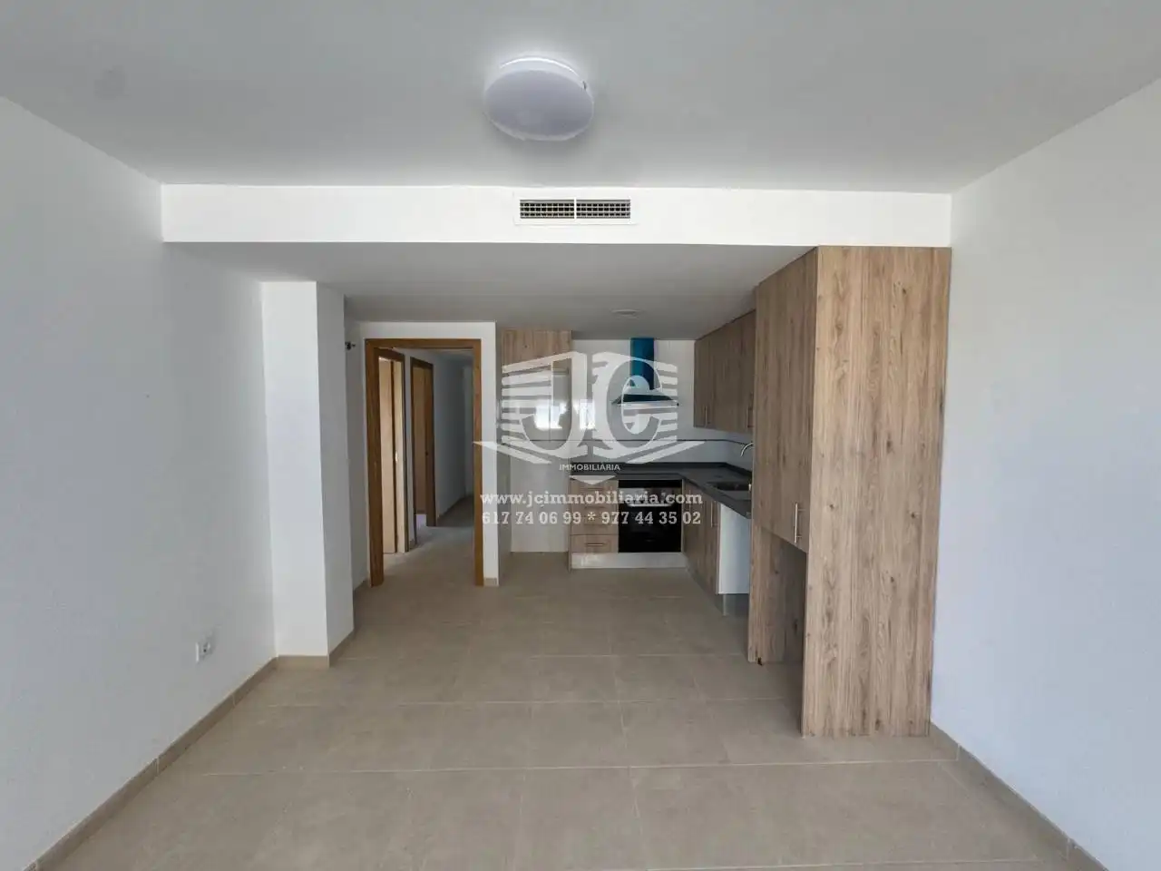 Kitchen of Flat for rent in L'Aldea  with Air Conditioner, Terrace and Storage room