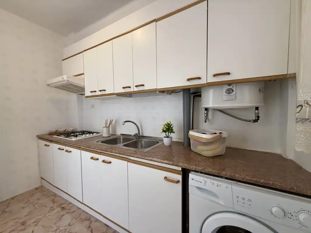 Küche von Wohnung zum Verkauf in Benicasim / Benicàssim mit Waschmaschine und Balkon