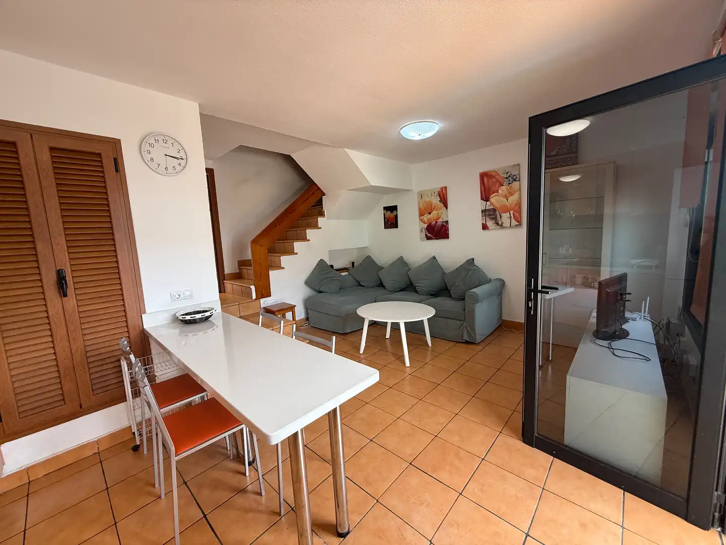 Sala d'estar de Casa adosada en venda en Mogán amb Jardí privat, Terrassa i Traster