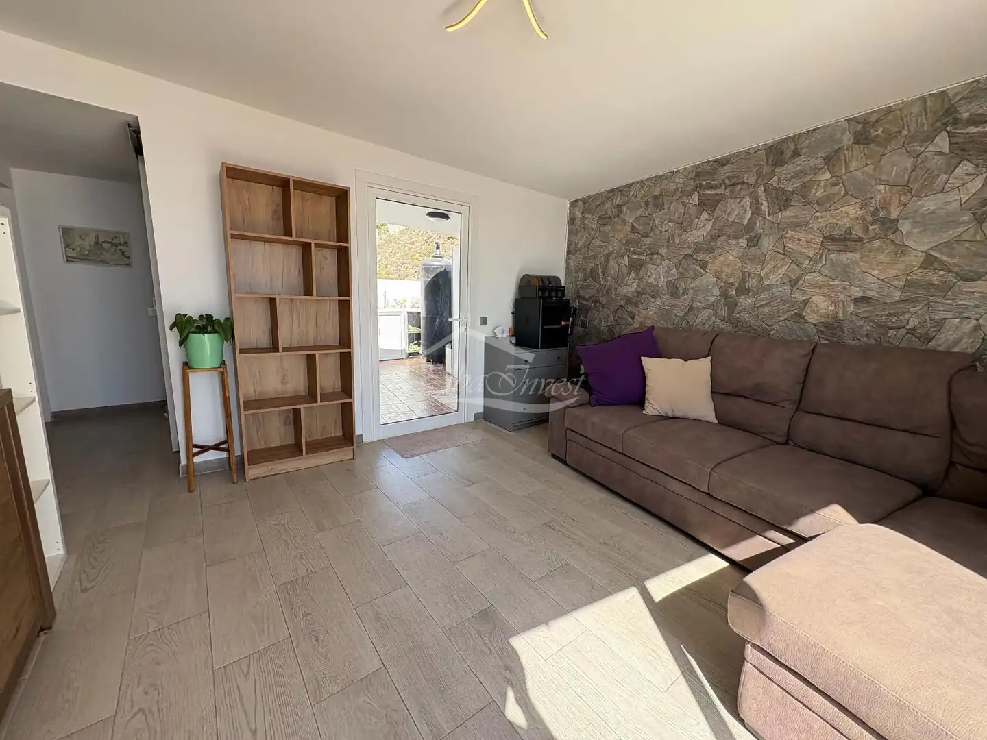 Sala d'estar de Casa adosada en venda en Adeje amb Aire condicionat, Terrassa i Moblat