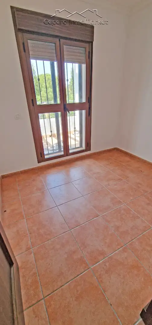 Schlafzimmer von Einfamilien-Reihenhaus zum Verkauf in El Puerto de Santa María mit Privatgarten und Balkon