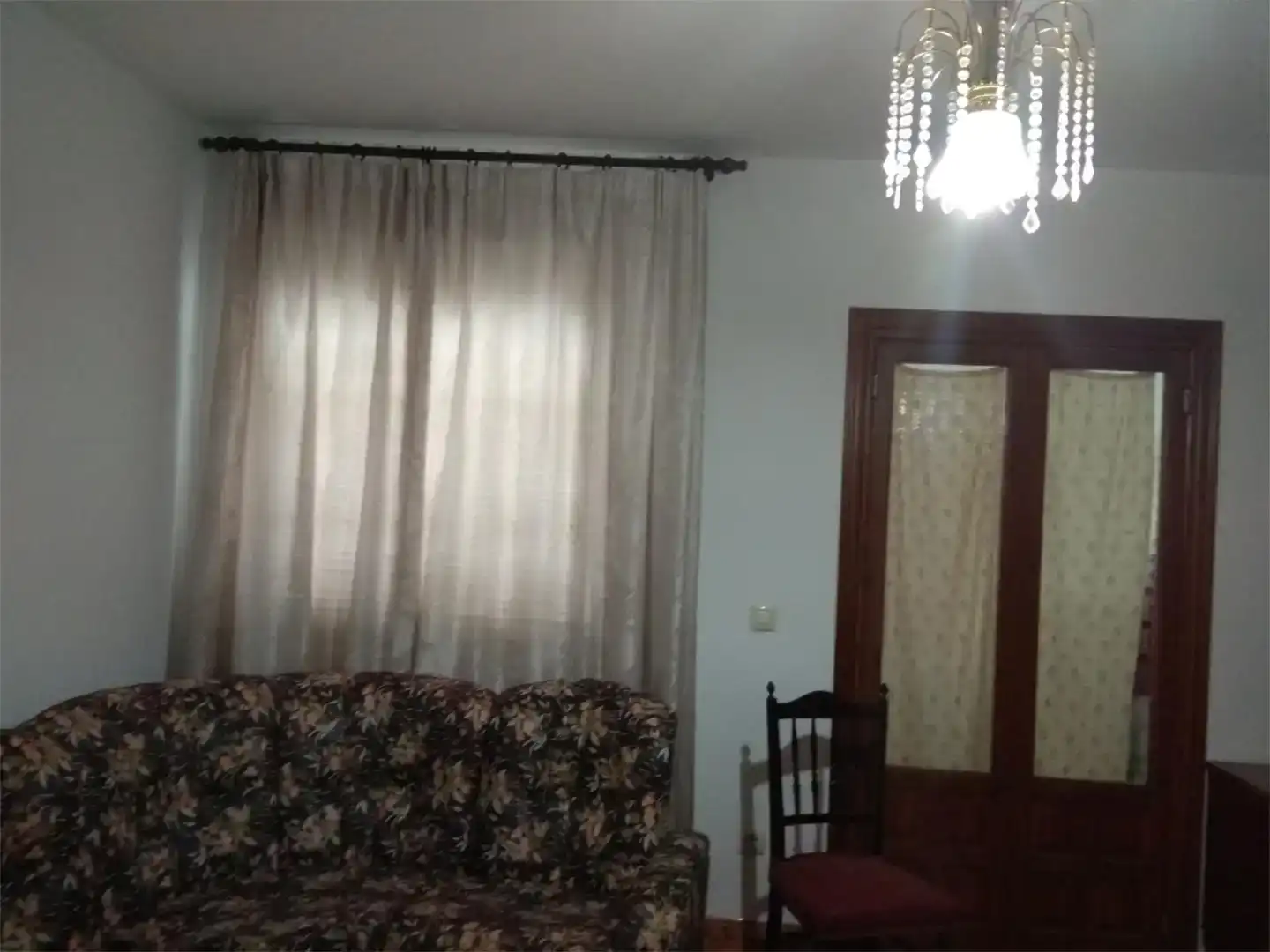 Sala d'estar de Casa adosada en venda en Arjonilla amb Aire condicionat, Traster i Balcó