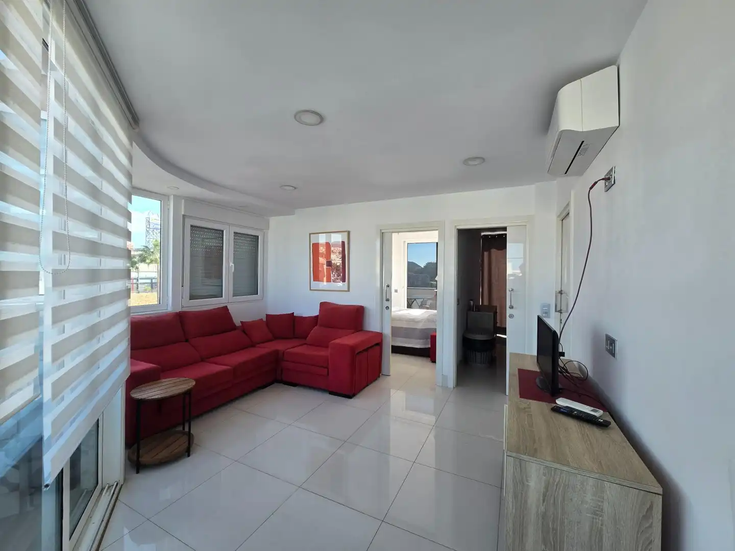 Sala d'estar de Àtic de lloguer en Mogán amb Aire condicionat, Moblat i Balcó
