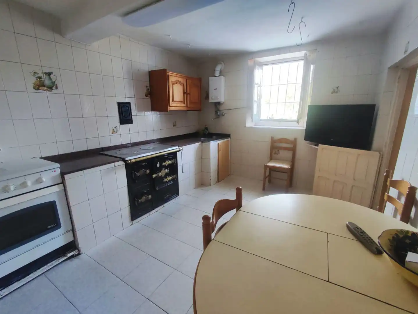 Cuina de Casa adosada en venda en Corvera de Toranzo amb Calefacció, Jardí privat i Parquet