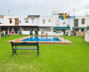 Exterior view of Single-family semi-detached for sale in Los Barrios  with Swimming Pool and Community pool