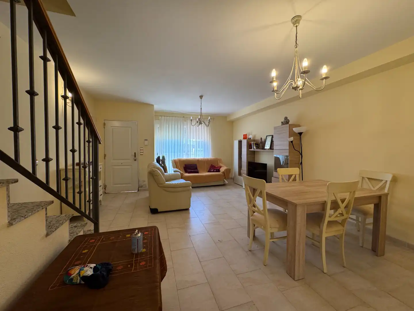 Sala d'estar de Casa adosada en venda en Pilar de la Horadada amb Aire condicionat, Jardí privat i Terrassa