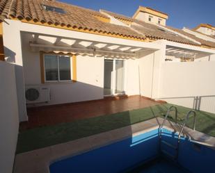 Swimming pool of Single-family semi-detached for sale in Benalmádena  with Air Conditioner, Private garden and Parquet flooring