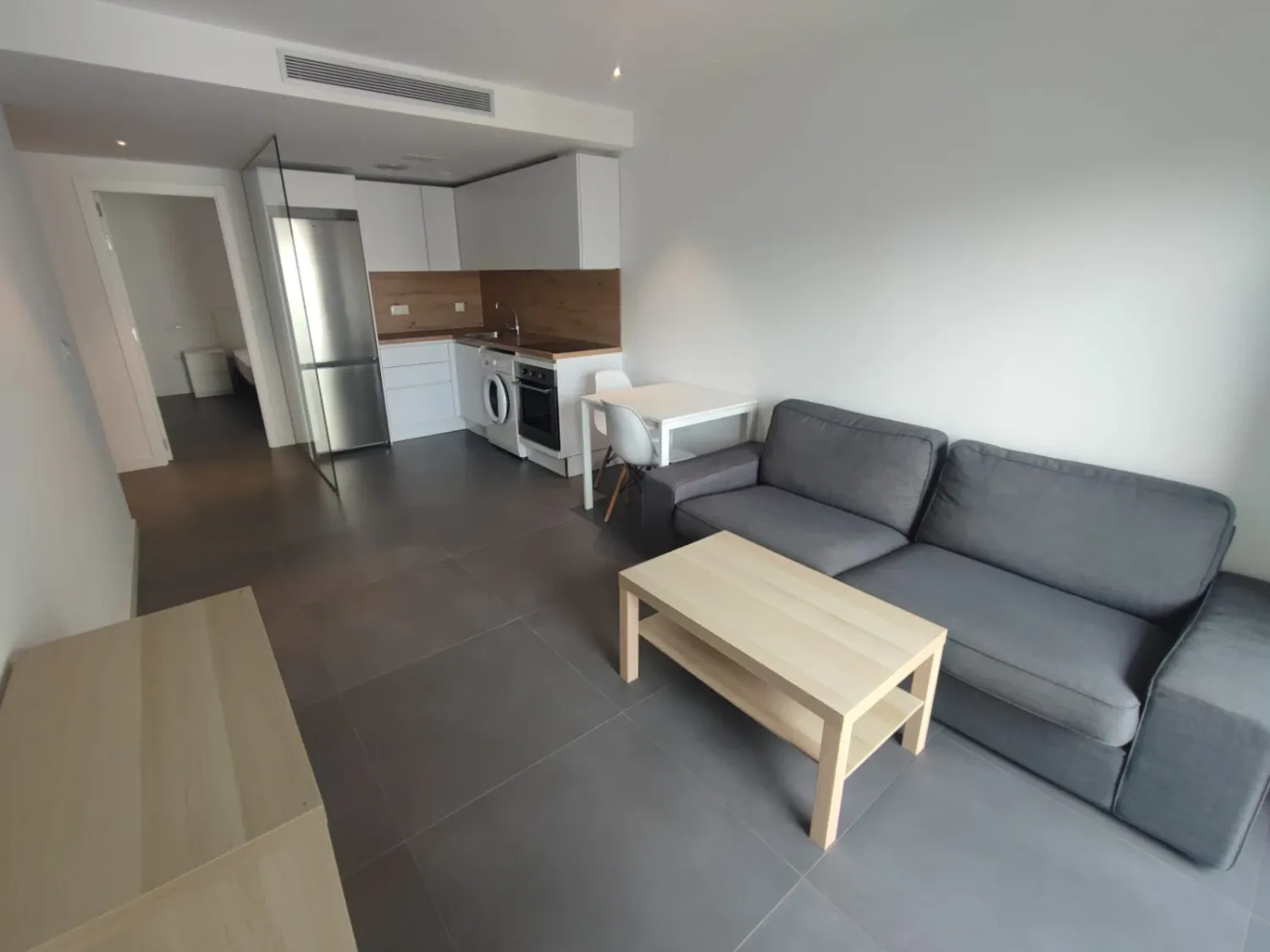 Sala d'estar de Apartament de lloguer en  Murcia Capital amb Aire condicionat, Moblat i Rentadora
