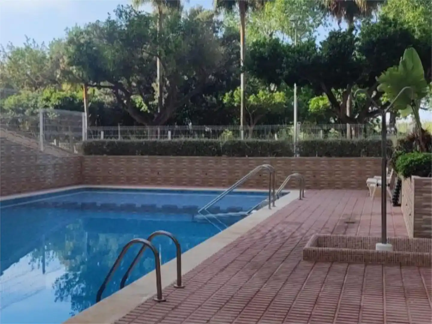 Schwimmbecken von Wohnung zur Miete in Cullera mit Schwimmbad und Balkon