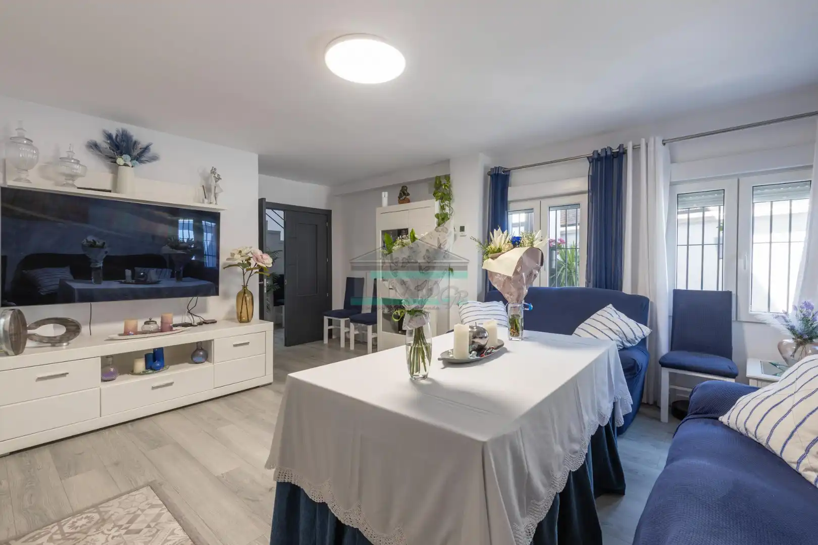 Sala d'estar de Casa adosada en venda en Maracena amb Aire condicionat, Calefacció i Jardí privat