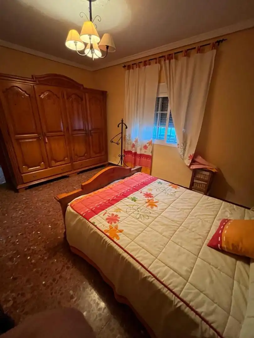 Dormitori de Casa adosada en venda en Villanueva del Río y Minas amb Aire condicionat, Calefacció i Terrassa