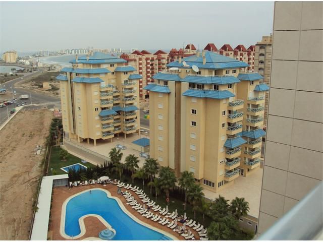 Exterior view of Apartment for sale in La Manga del Mar Menor  with Terrace, Swimming Pool and Balcony