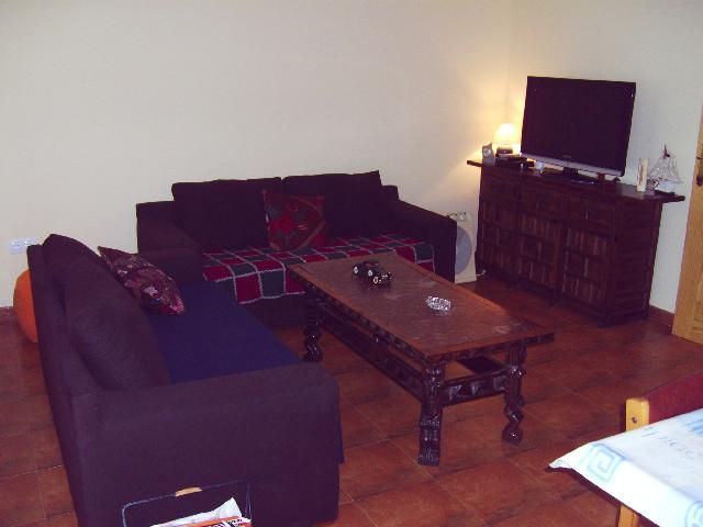 Living room of Single-family semi-detached for sale in Benlloch  with Terrace, Furnished and Oven