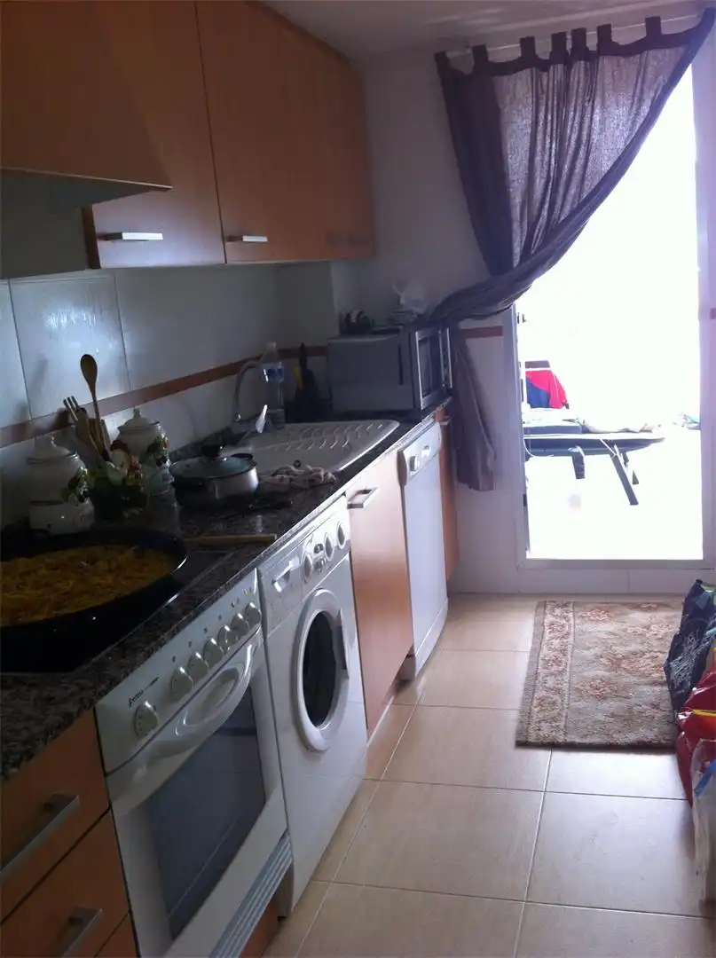 Flat for rent in Calle del Maestrat, 9, Playa de Gandia Kitchen of Flat for rent in Gandia with Private garden, Terrace and Swimming Pool