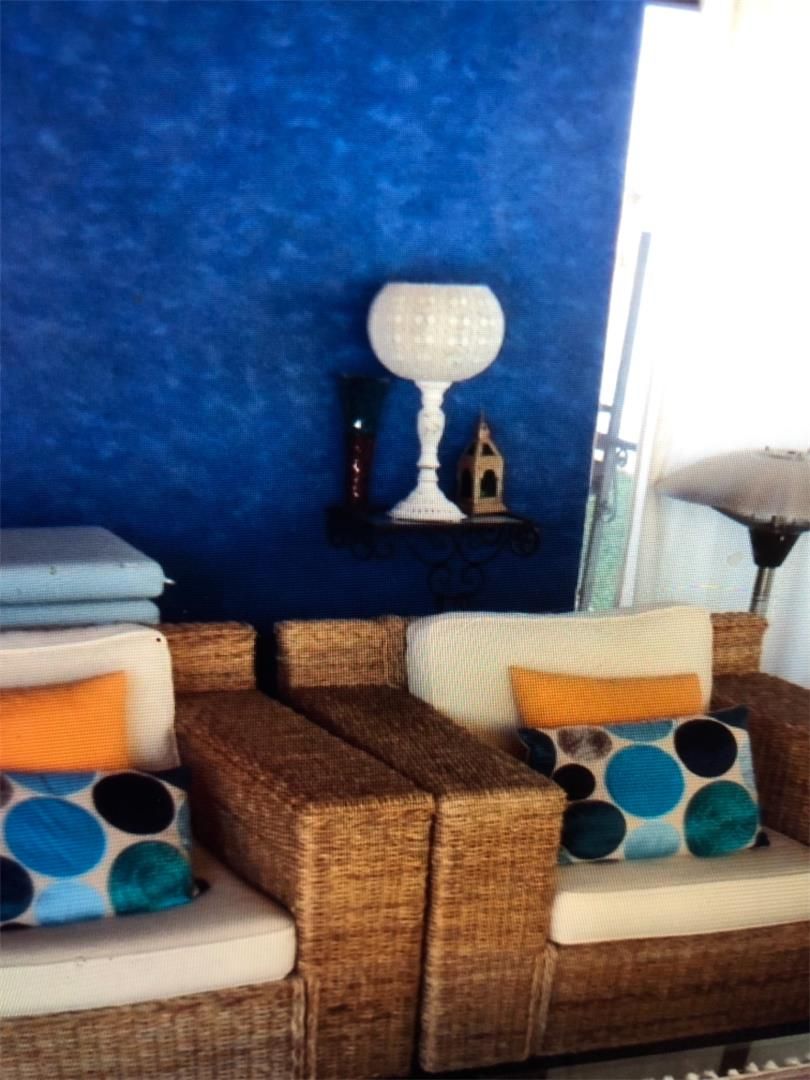 Sala d'estar de Casa o xalet en venda en Benalmádena amb Aire condicionat, Jardí privat i Terrassa