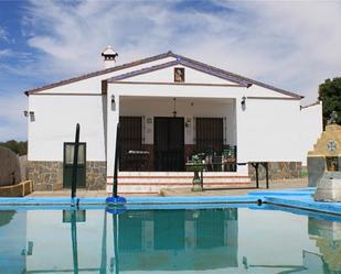 Vista exterior de Casa o xalet en venda en Alanís amb Aire condicionat, Calefacció i Jardí privat