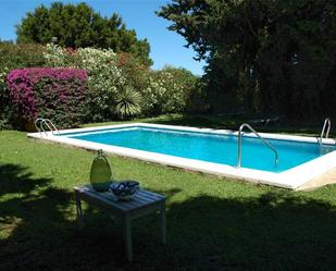 Piscina de Casa adosada de lloguer en Conil de la Frontera amb Terrassa