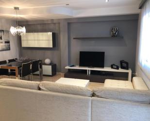 Sala d'estar de Casa adosada en venda en Benigánim amb Aire condicionat, Terrassa i Balcó