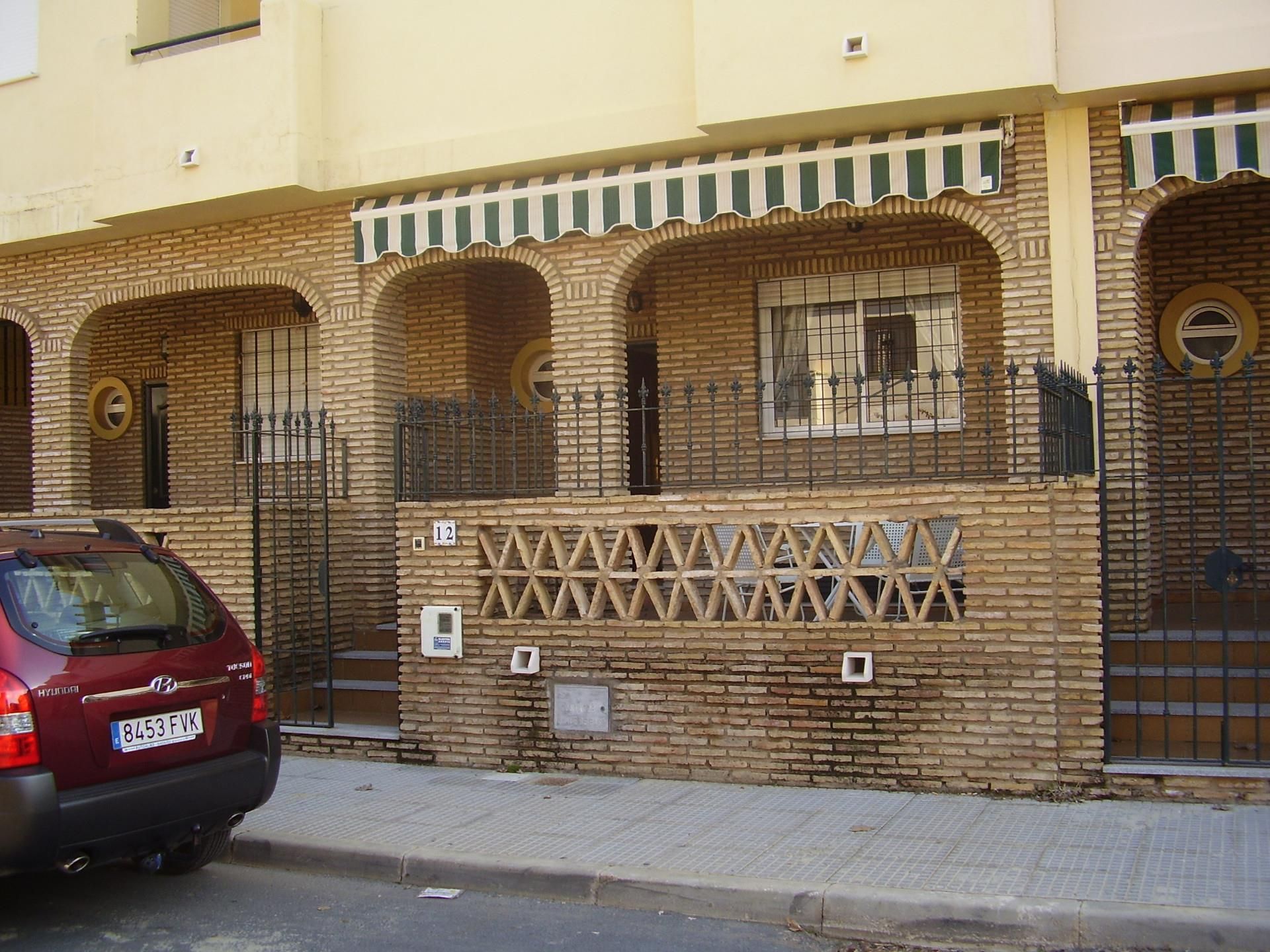 Vista exterior de Casa adosada de lloguer en La Antilla amb Terrassa, Traster i Piscina